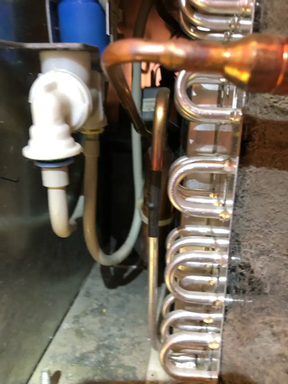 Mr. Fixer technician performing compressor & sealed system repair