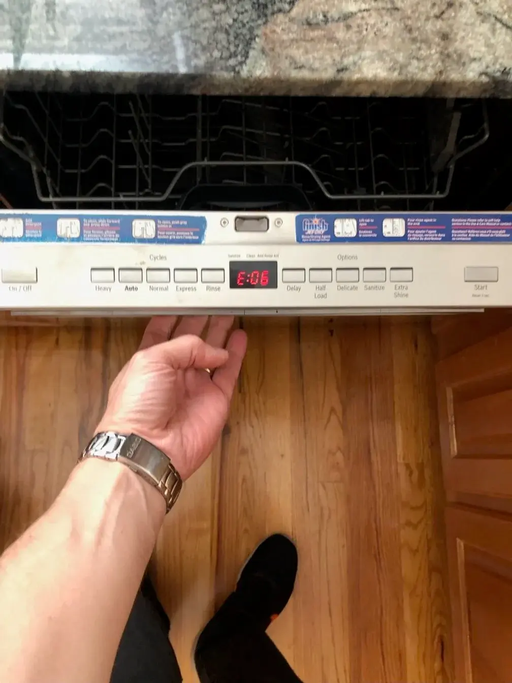 Mr. Fixer technician repairing a Bosch appliance