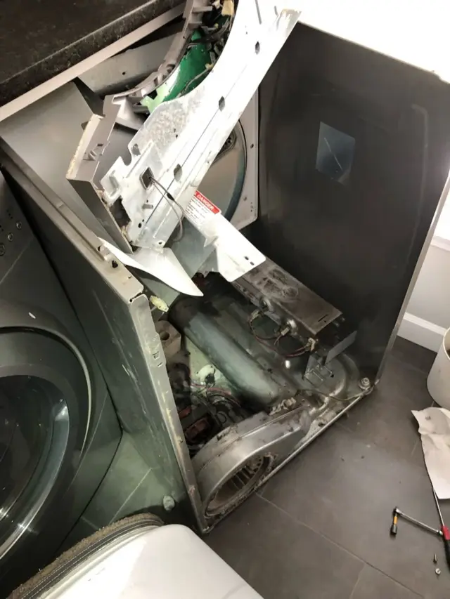 Appliance repair job completed by a Mr. Fixer technician